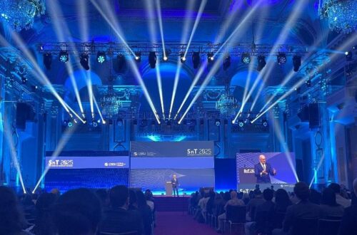 Scene in the Hofburg Palace, Vienna, during the CTBT: Science and Technology Conference 2025. Blue light illuminates the room.